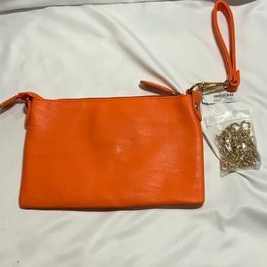 Charming Charlie wristlet Orange